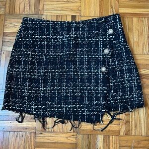 Black and white tweed skirt with pearl button embellishments